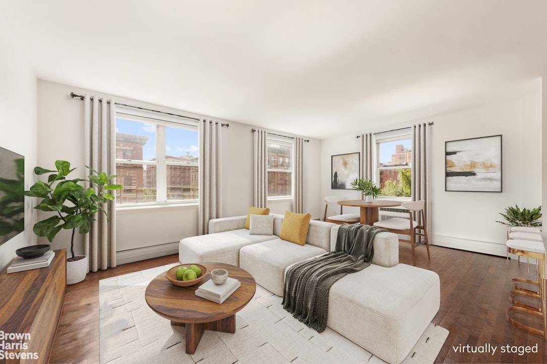 Welcome to this sun filled 2 bedroom, 1.
