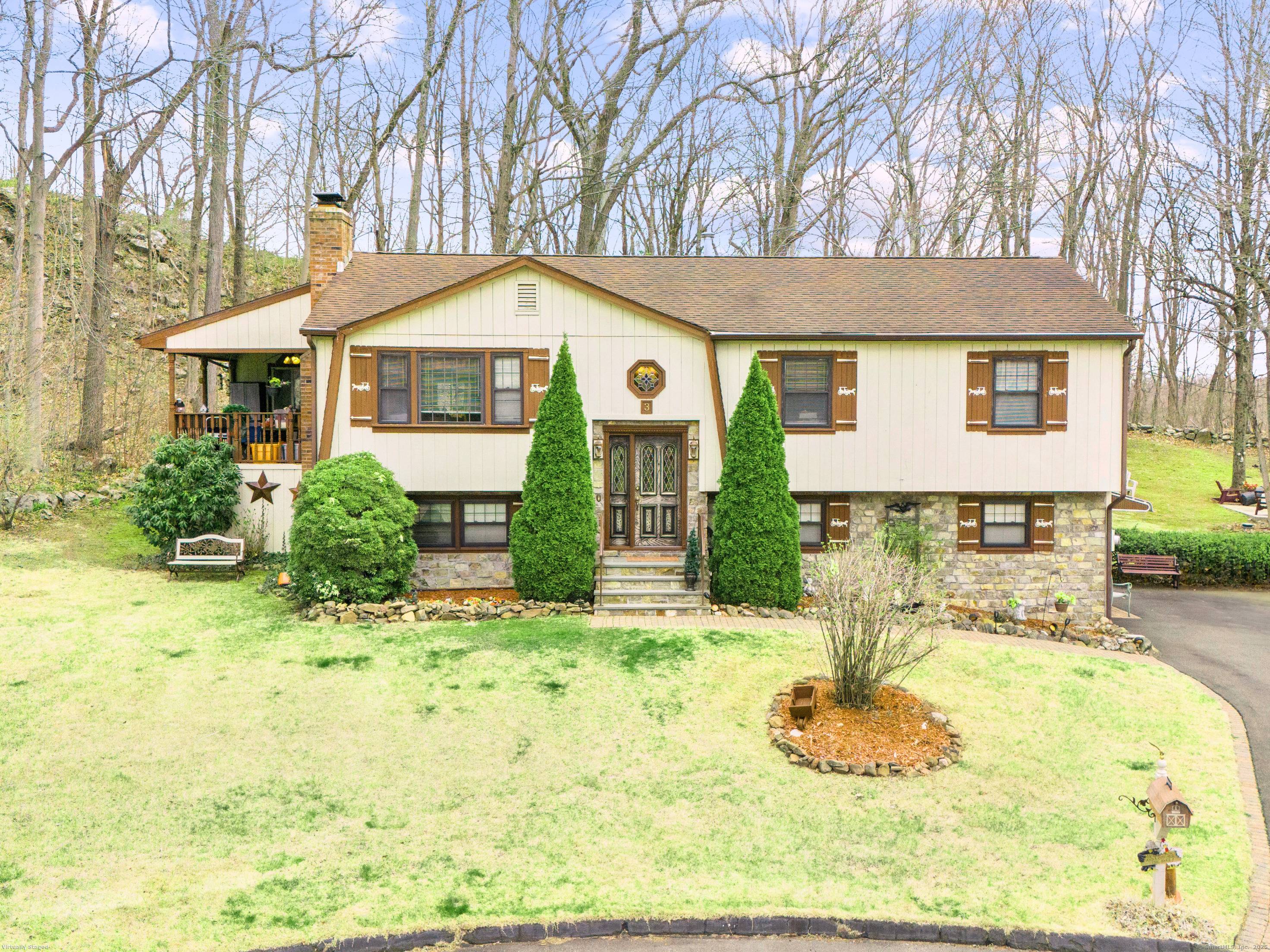 Charming Stone Faced Generational Home with Legal In Law Suite on Quiet Cul de Sac.