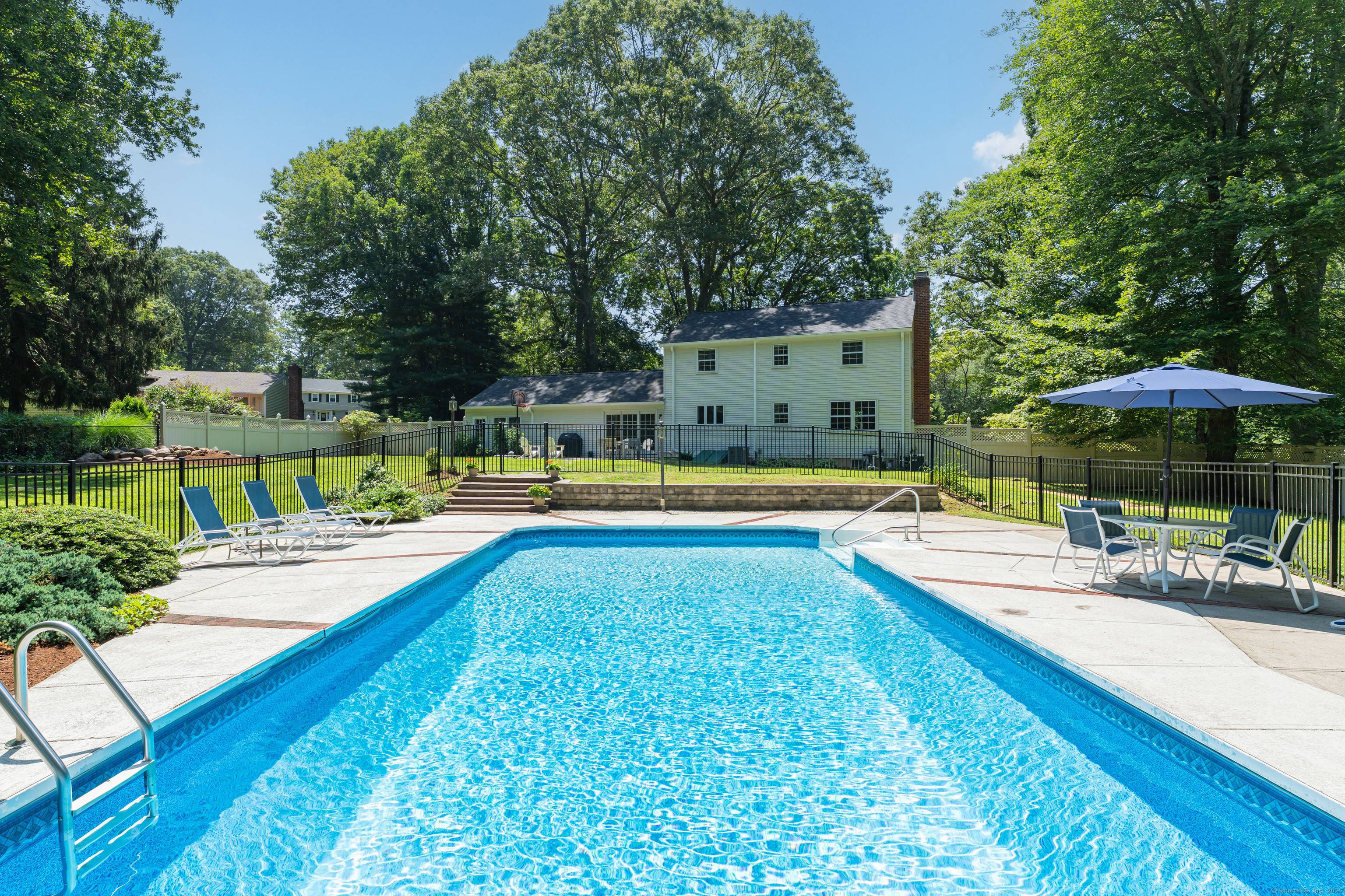 Spacious 4 bedroom colonial with pool in prime location !