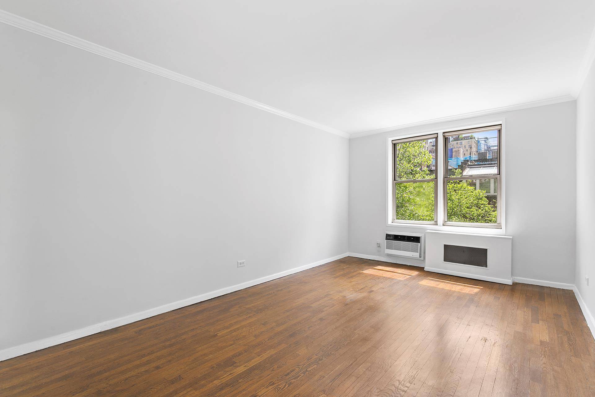 Apartment 5B at 64 East 94th Street in Carnegie Hill, is bathed in light, overlooking rear gardens and pin drop quiet.