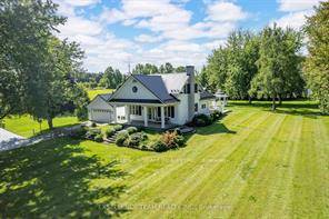 This 34 acres custom home can only be described as elegant.