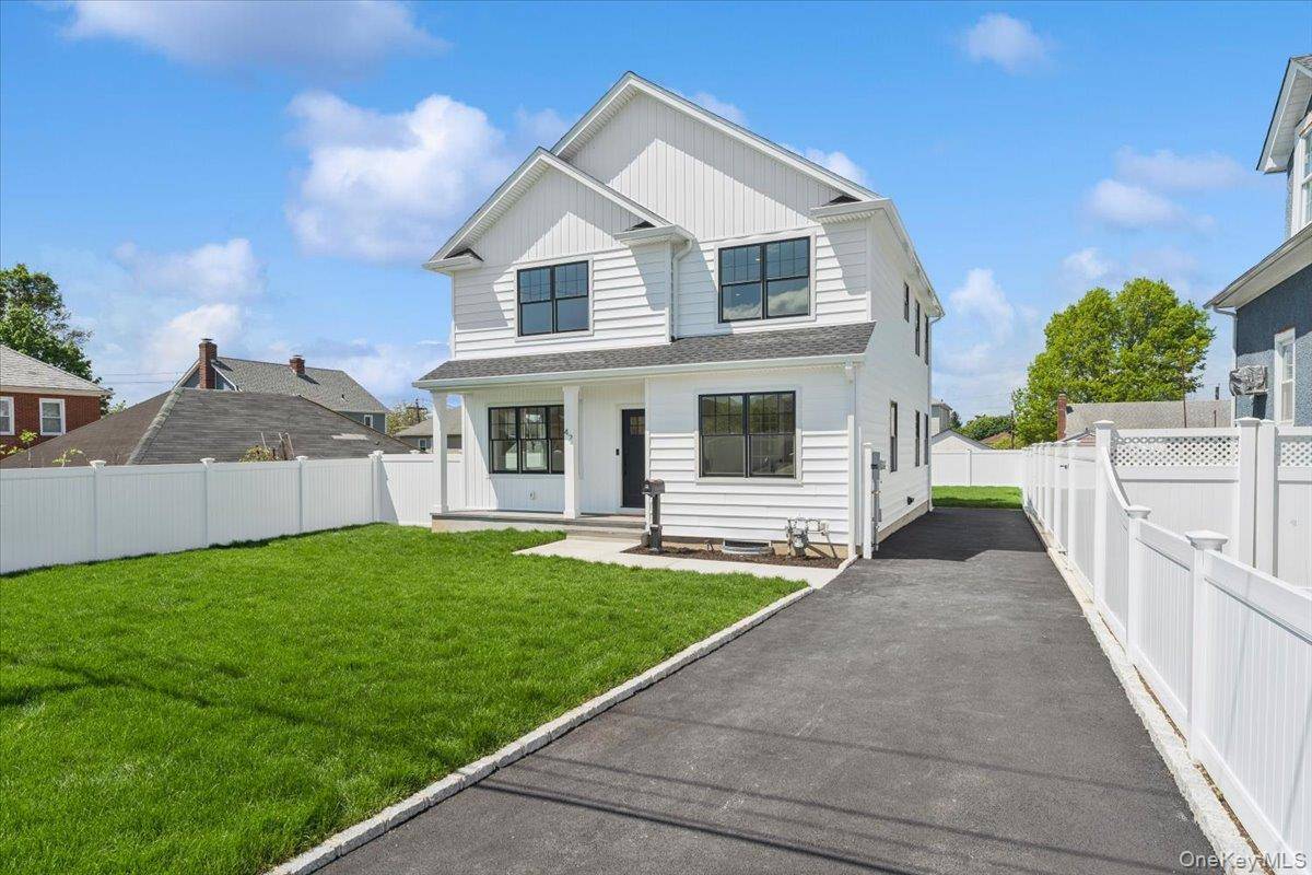 Experience elevated living in this stunning new construction home located at 42 Second Street in the heart of Glen Cove.