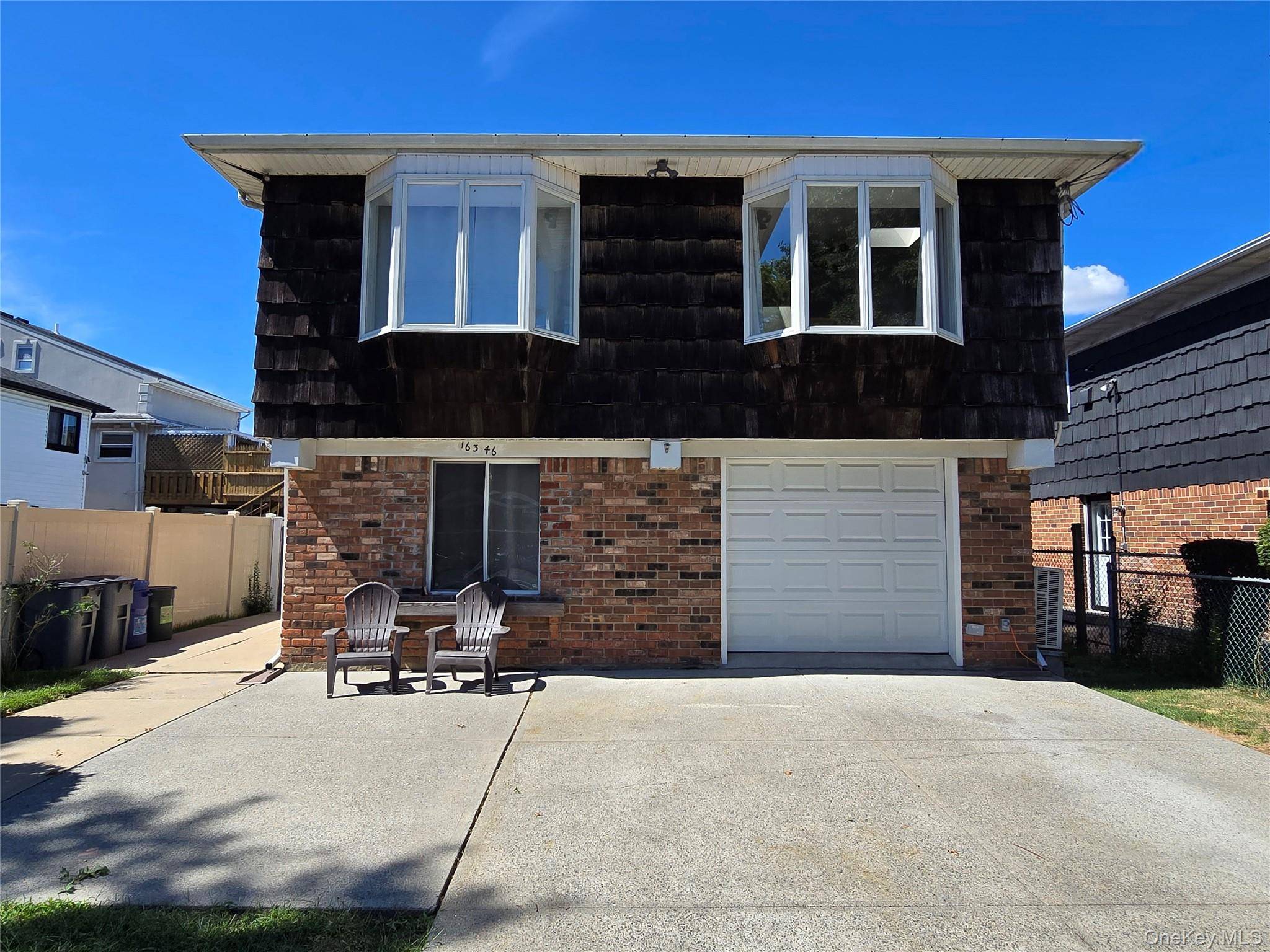 Welcome to this expansive Brookfield oversized high ranch in the heart of Howard Beach, with five bedrooms, three full bathrooms, and an attached garage.