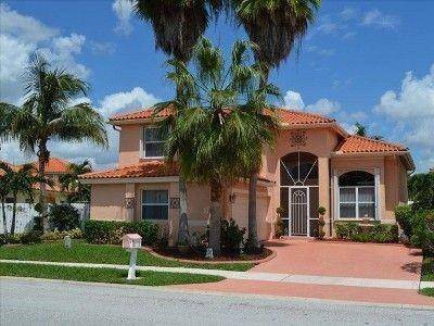 MAKE THIS BEAUTIFUL AND SPACIOUS FOUR BEDROOM THREE FULL BATH HOME YOURS !