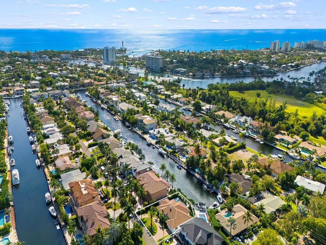 Stunning Lighthouse Point Coastal Home offering both community and waterfront lifestyles.