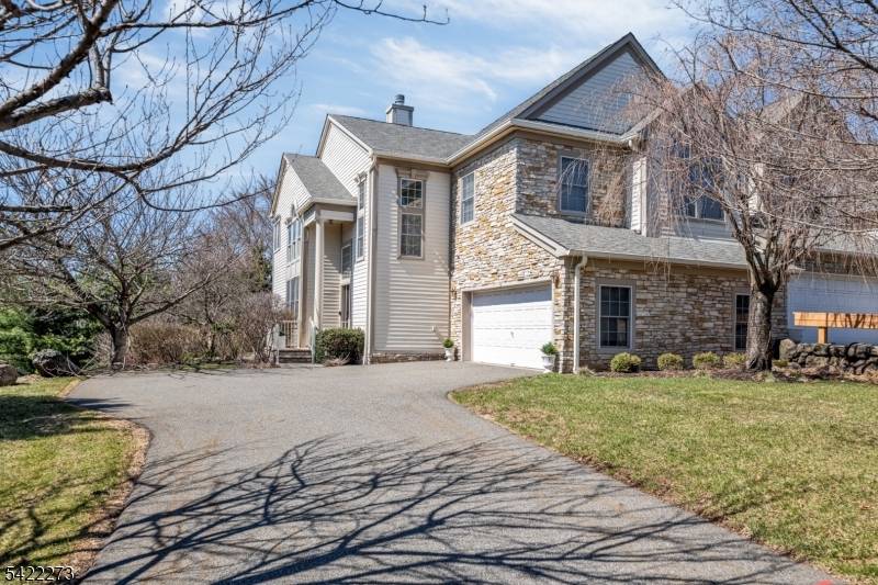 Absolutely immaculate end unit townhome in desirable Summit Pointe offering 3 bedrooms, 3.