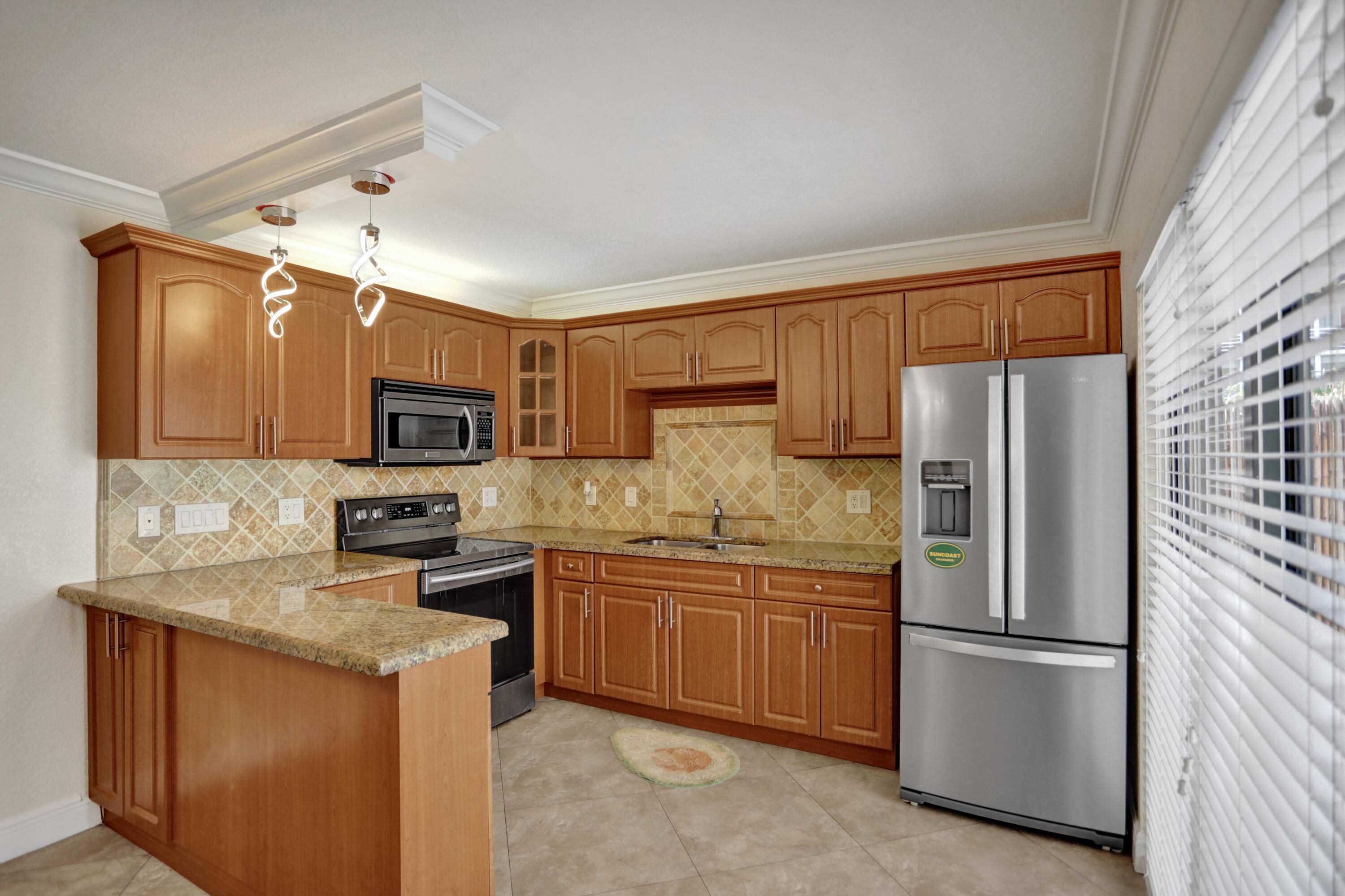 This beautifully upgraded and freshly renovated townhouse is located in the heart of Palm Springs, just a mile away from I 95.