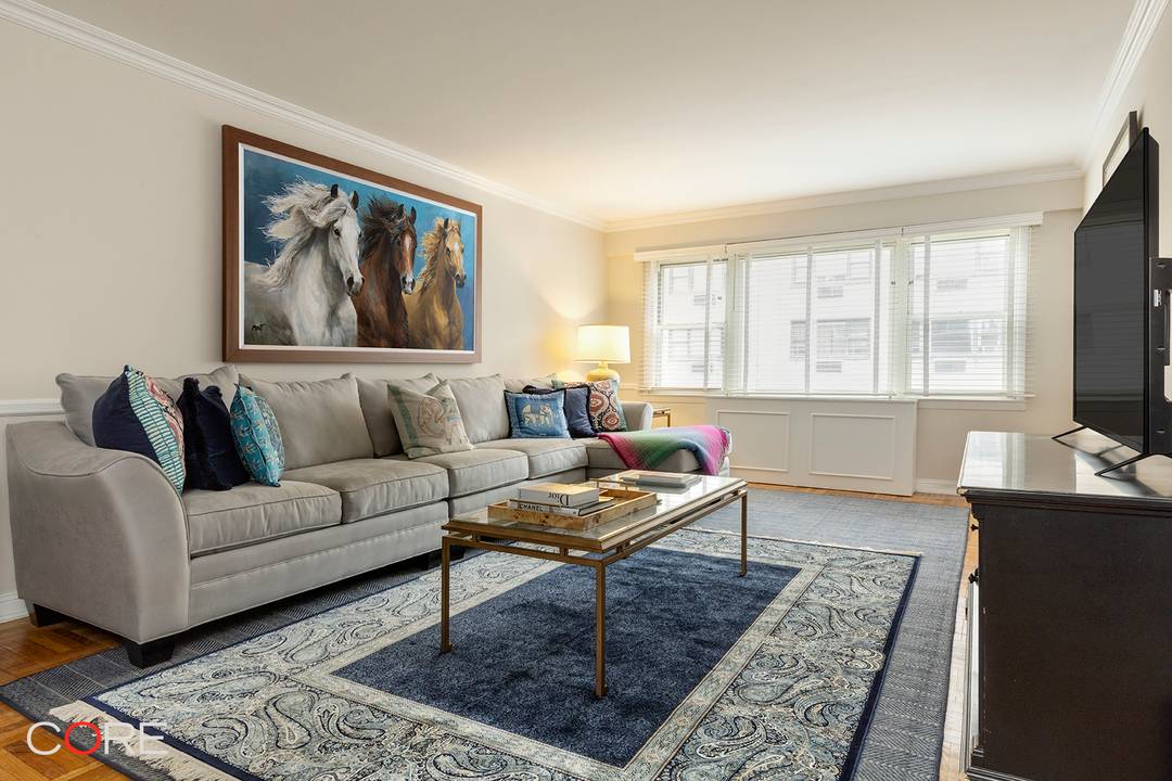 The grand entrance foyer of this one bedroom home opens into the great room, which spans nearly 35 feet across the formal dining area and the sprawling living room, with ...