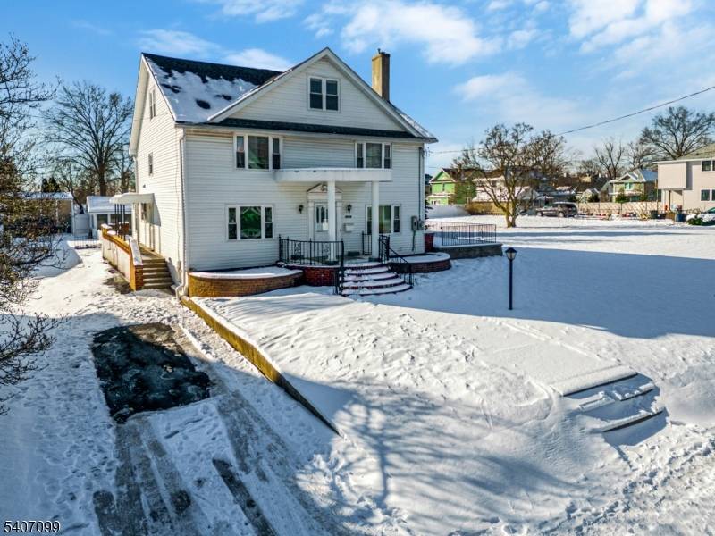 Opportunity is knocking with this Stunning 5 Bedroom, 3 Level Home with Income Potential Also Available with Adjacent Buildable Lot.