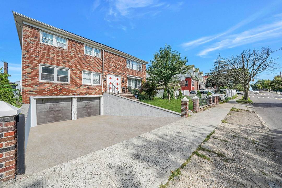 8 Bedroom Zoned R3X Brick 2 Family with Finished Basement Bonus Surprise !