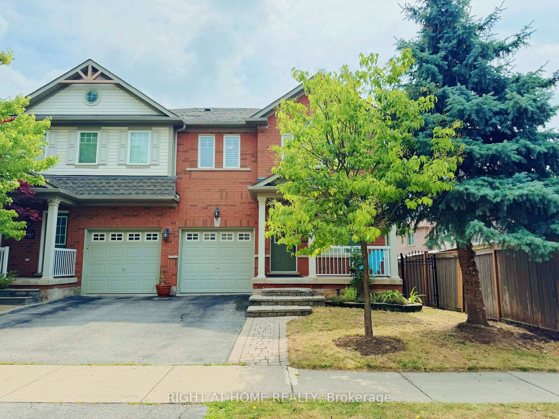 Welcome To Bronte Creek. This End Unit Has Lots Of Sunlight With An Oversized Backyard And A Spacious Deck.