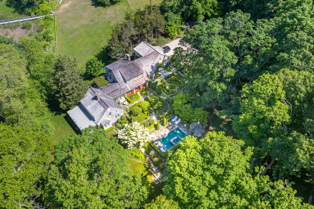 Perched on a stunning rise overlooking the Connecticut River, this remarkable residence, appropriately named River Knoll, incorporates an 18th Century Cape with dramatic additions that blend seamlessly with the original ...