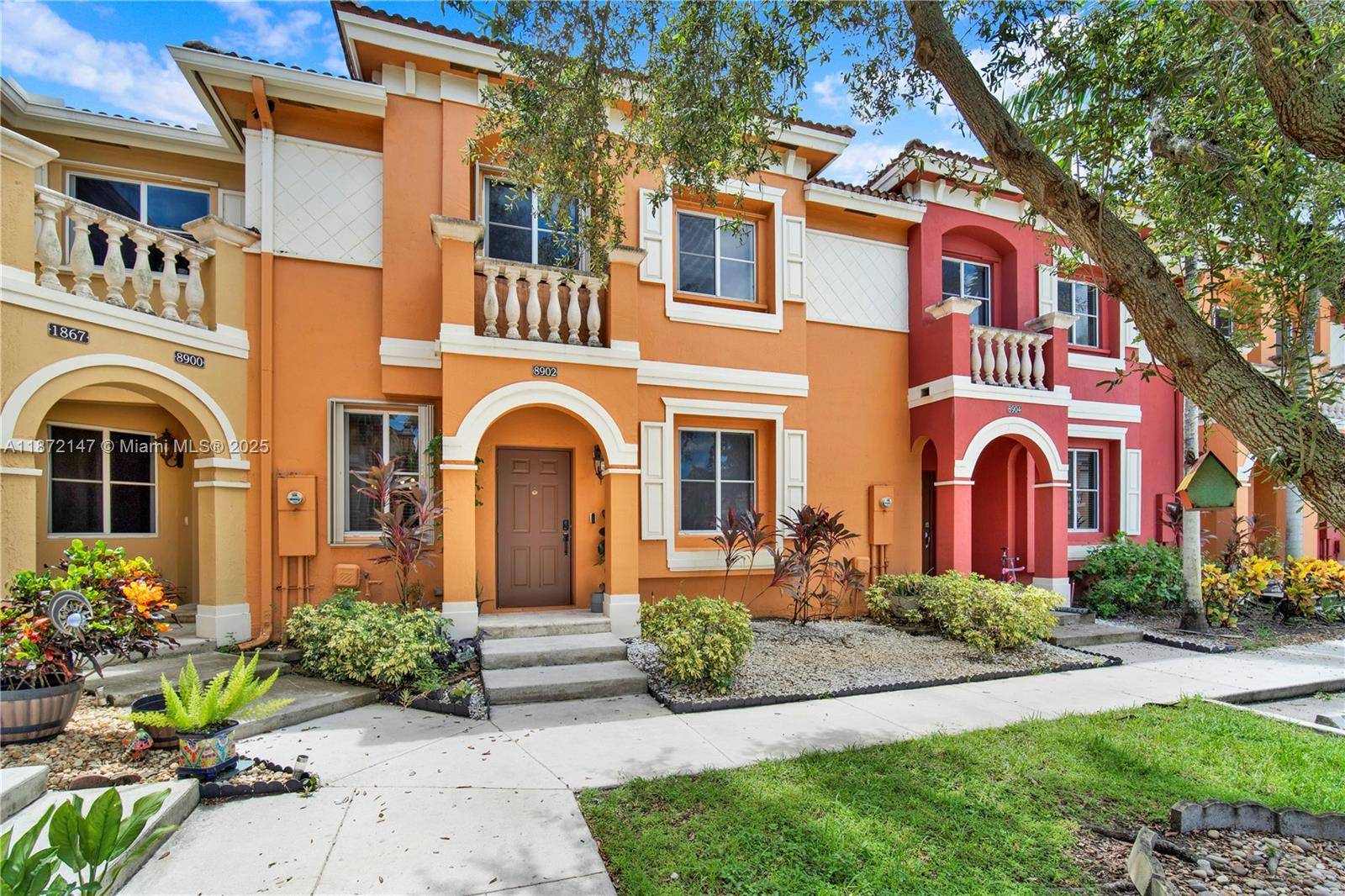 Beautiful corner 2BR 2. 5BA townhouse located in the gated community of Village at Country Walk.