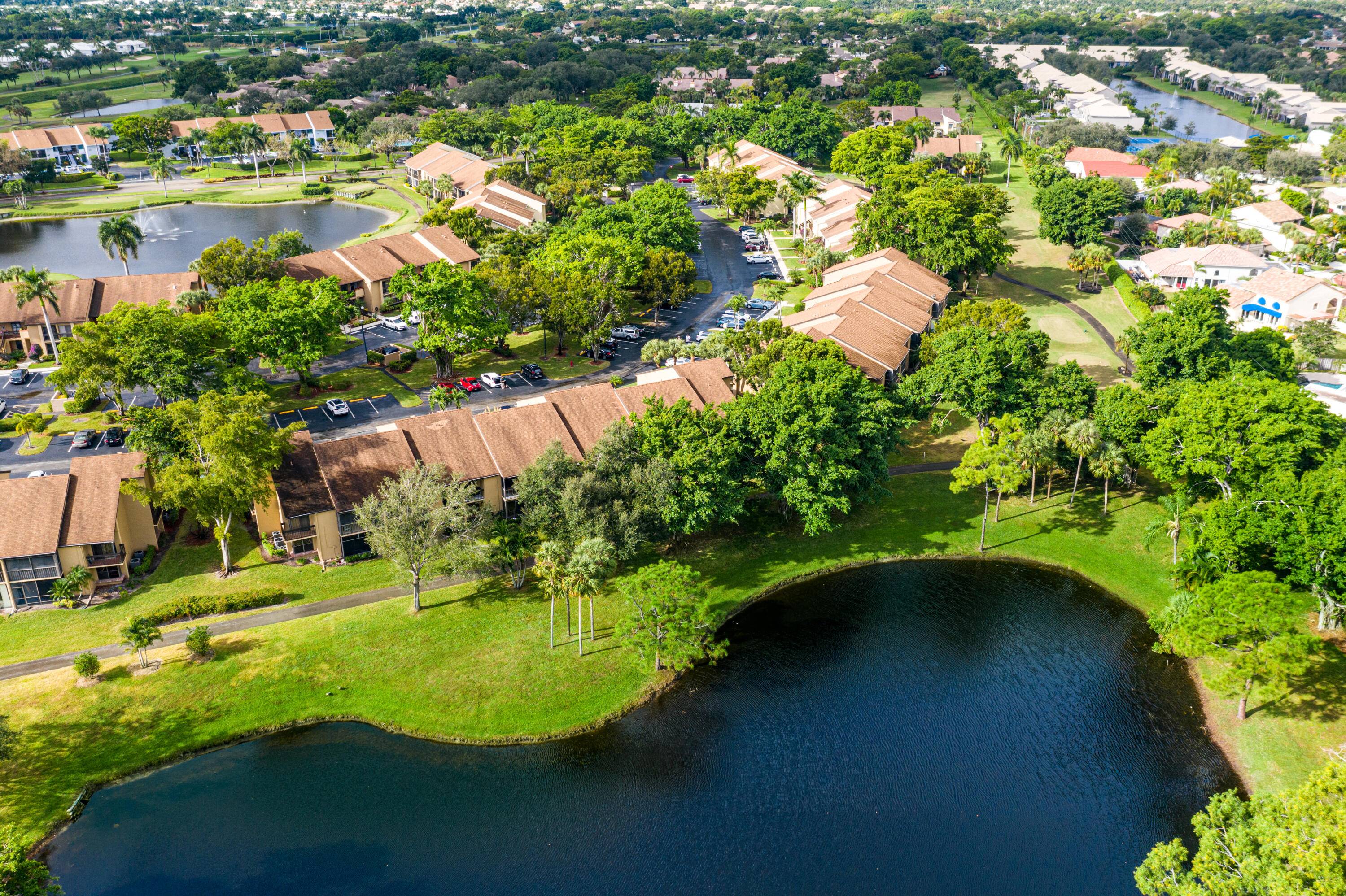 REDUCED Lake Views from this1st Floor Corner Garden Condo on the 12th Hole The Bee Hive across the lake makes our honey that we sell in the cafe Up Dated ...