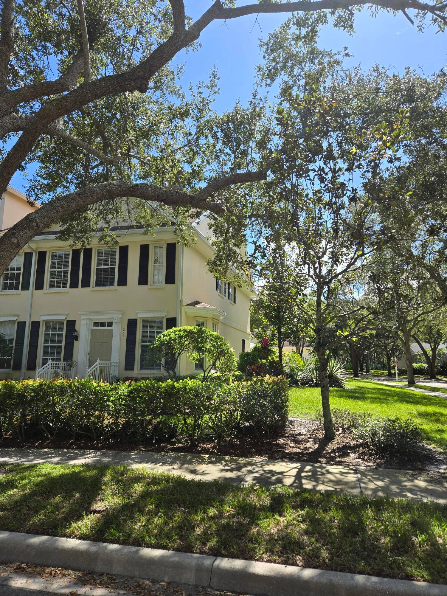THIS STUNNING, VERY RARE, ''END'' UNIT TOWN HOME IS LOCATED IN THE DESIRABLE ABACOA COMMUNITY OF NEW HAVEN OFFERING A LARGE SIDE YARD !