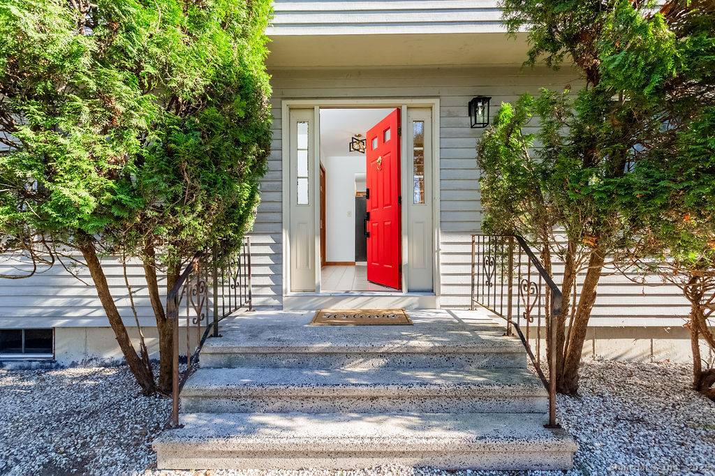 This well maintained center hall colonial sits on a serene acre at the end of a peaceful cul de sac.