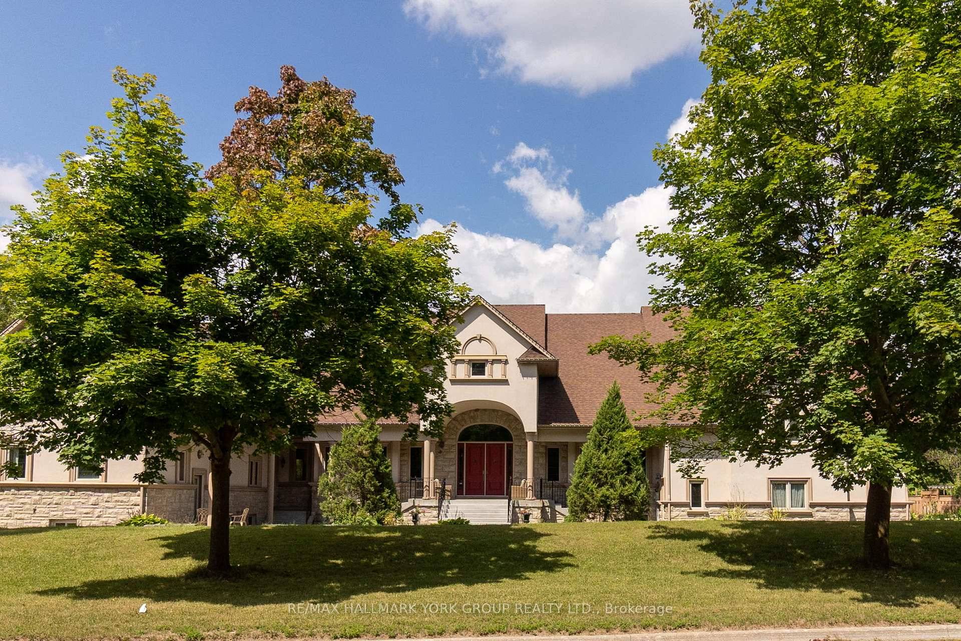 Step beyond the ordinary and into an architectural opus a custom estate of approx.