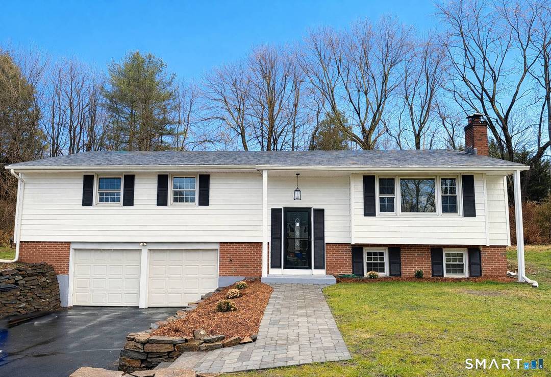 Experience refined living in this exceptionally renovated raised ranch, ideally situated in one of West Hartford's most desirable neighborhoods.