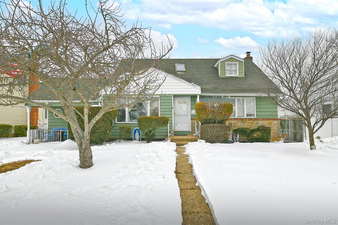 Welcome to your expanded Cape in the heart of East Meadow !