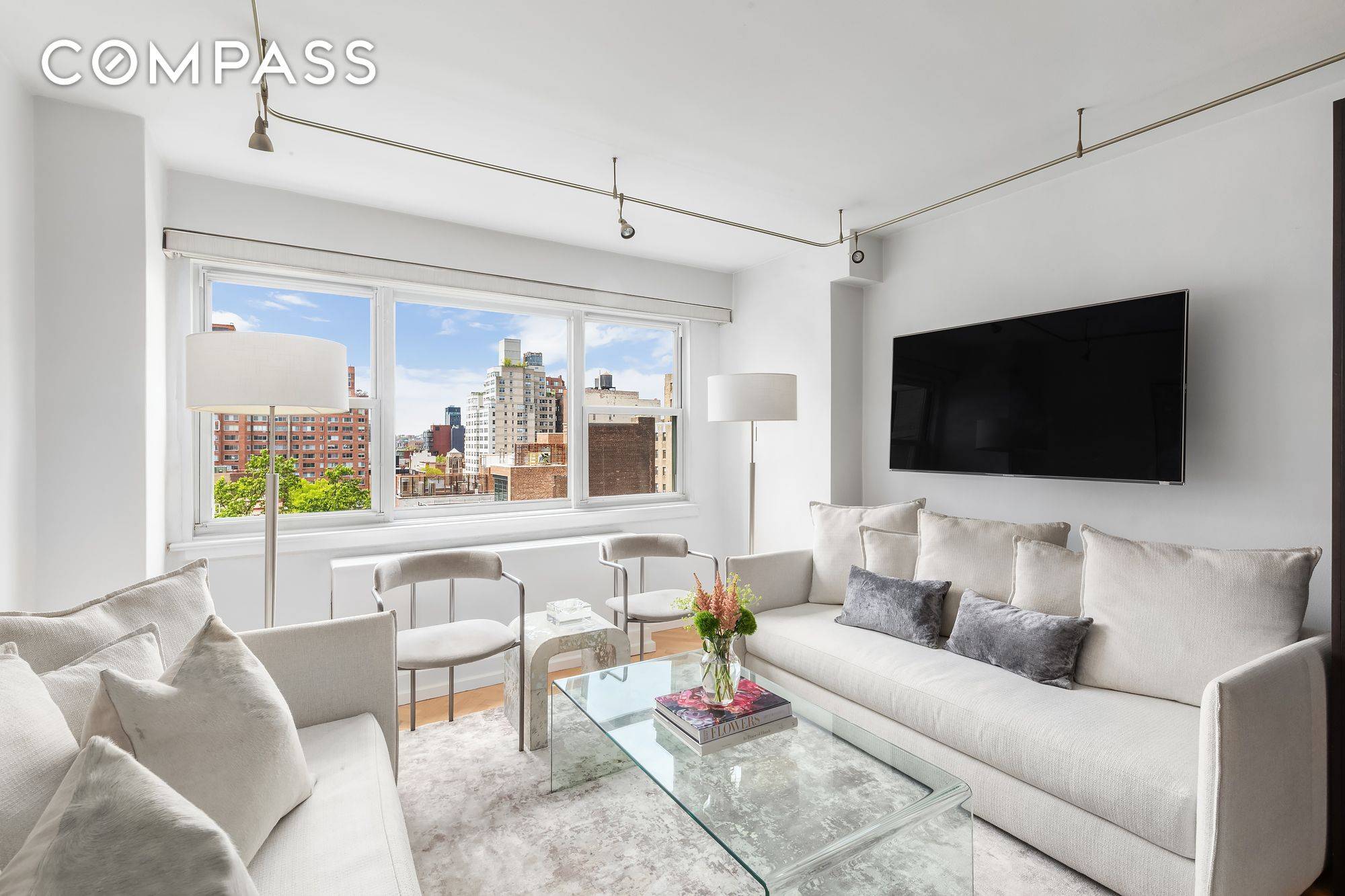 Completely renovated, turnkey studio with bright western exposure on a high floor at the desirable John Adams cooperative.