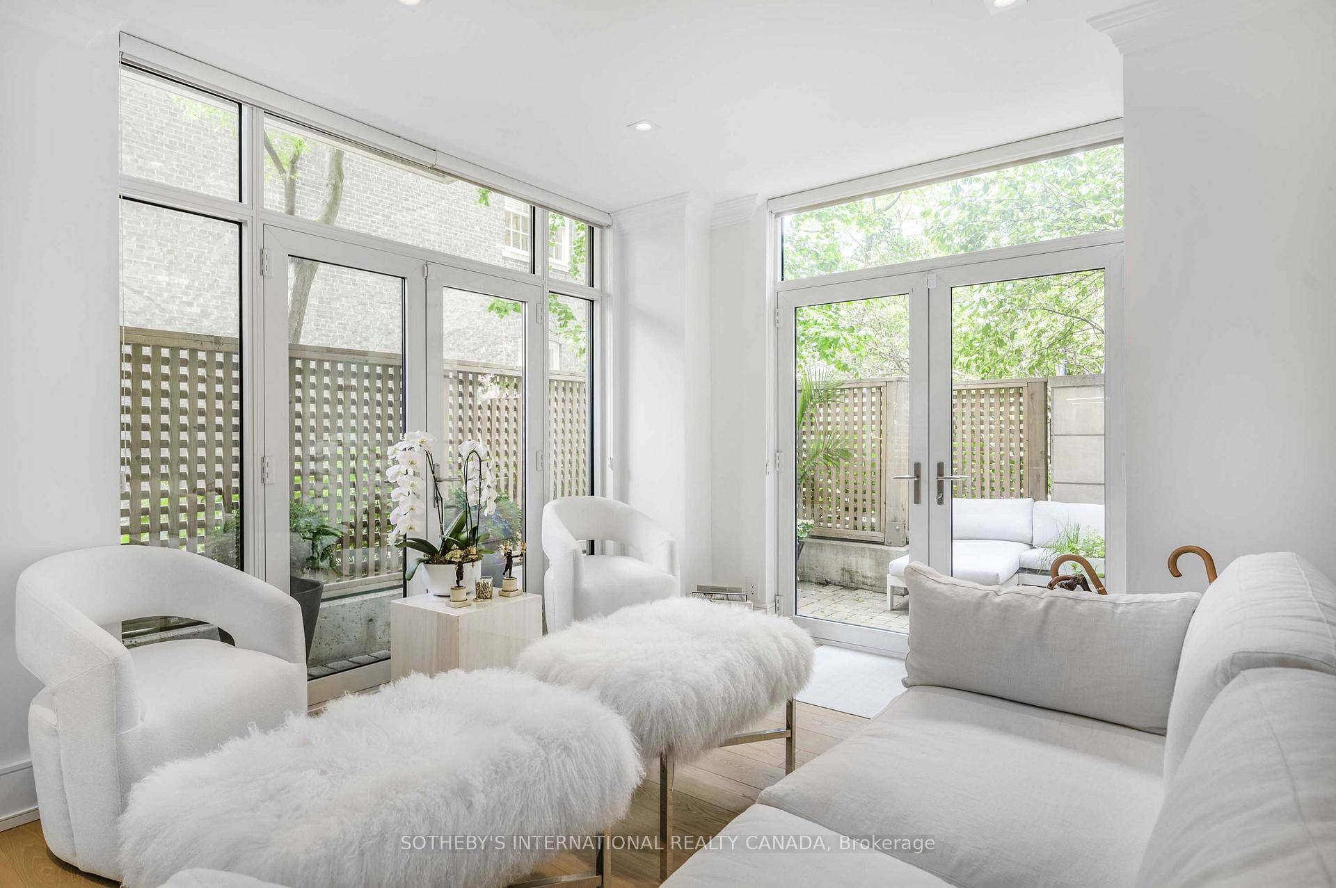 Welcome to this stunning, exceptionally renovated garden suite at 10 Delisle Avenue offering approx.
