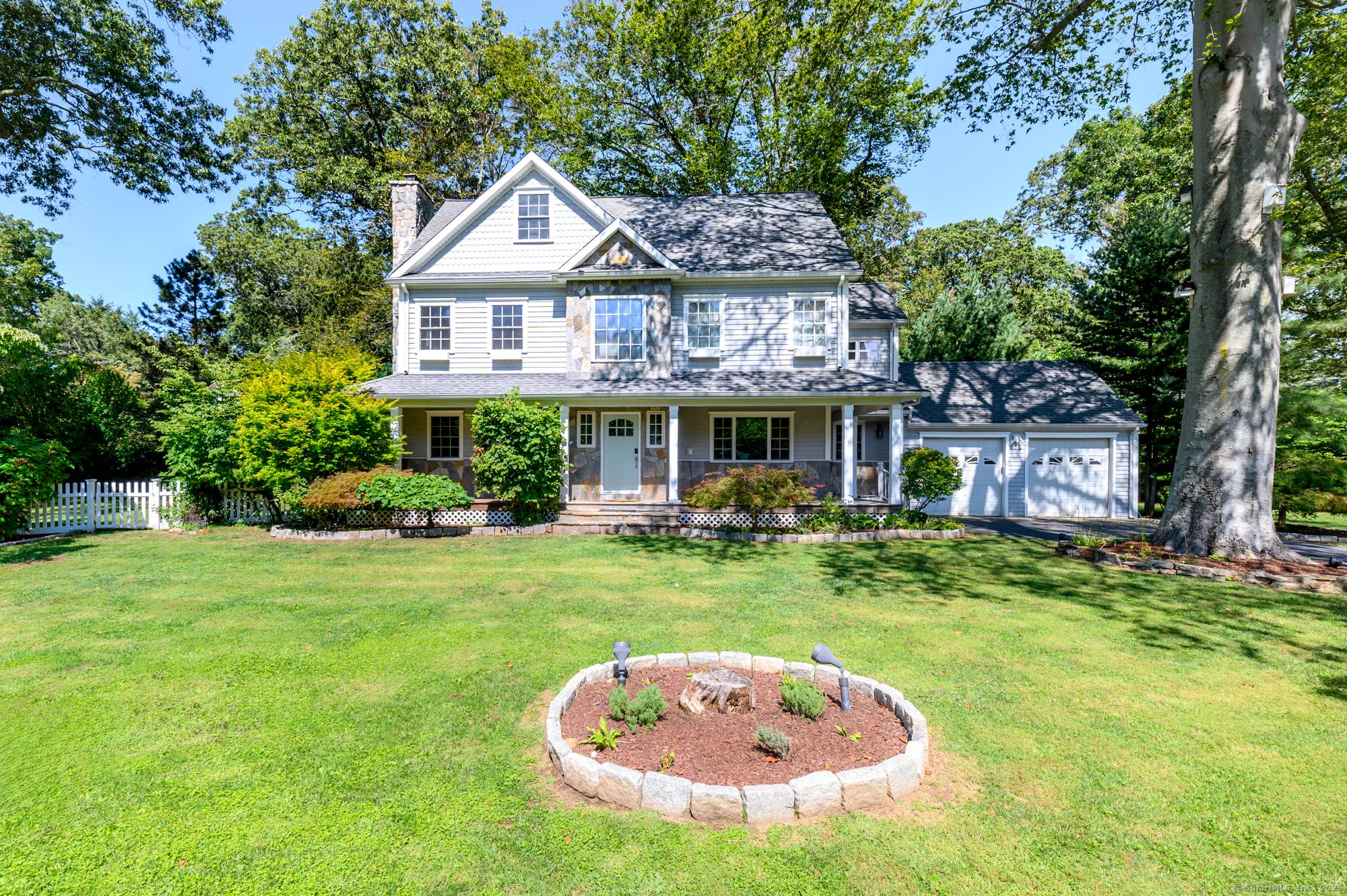 Welcome to 300 Winnepoge, a beautifully appointed home in Fairfield's desirable Lake Hills community.