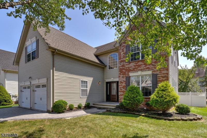 Stately, immaculate renovated Brick front home is nestled within a highly sought out neighborhood.