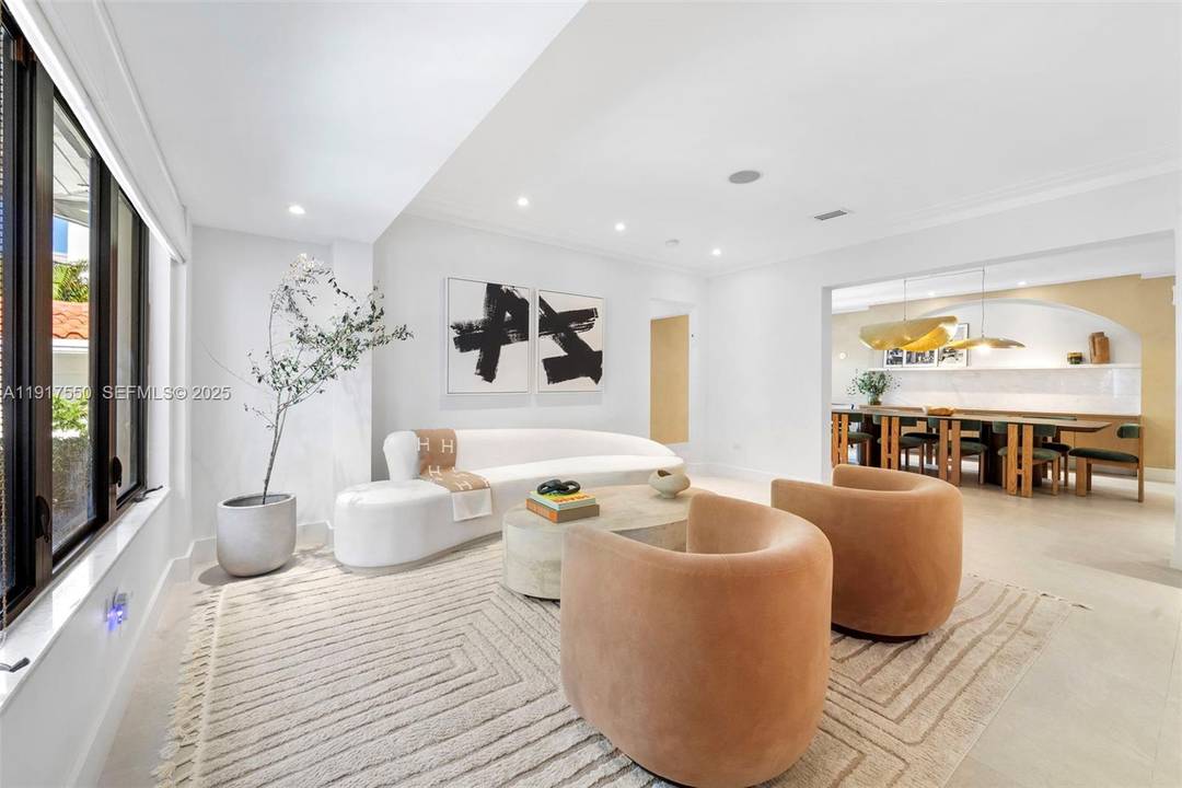 Sophisticated fully renovated Mid Beach home featuring 4BR 3.