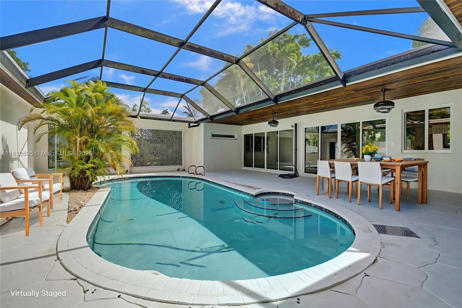 Fully Renovated With New PVC Plumbing amp ; 2021 Electrical This Updated 2, 749 SF Residence Offers Seamless Indoor Outdoor Flow With Full Impact Protection, Lush Landscaping, and Smart LED ...