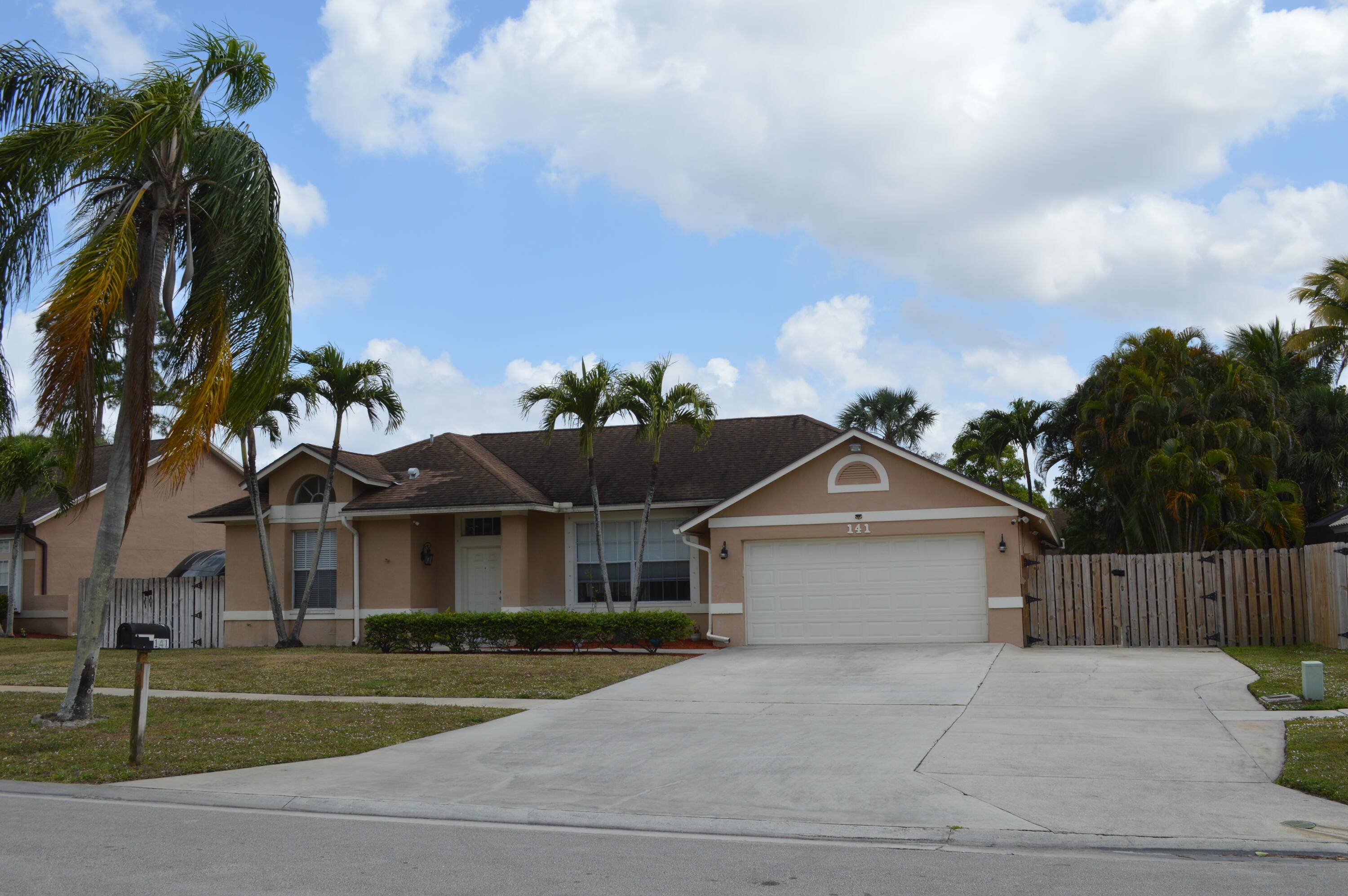 Great opportunity for a 4 bedroom, 2 bath pool home in a wonderful community with NO HOA in the center of Royal Palm Beach.