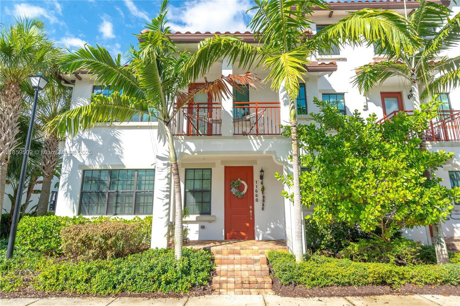Stunning Ventura model townhome in exclusive gated Raintree !