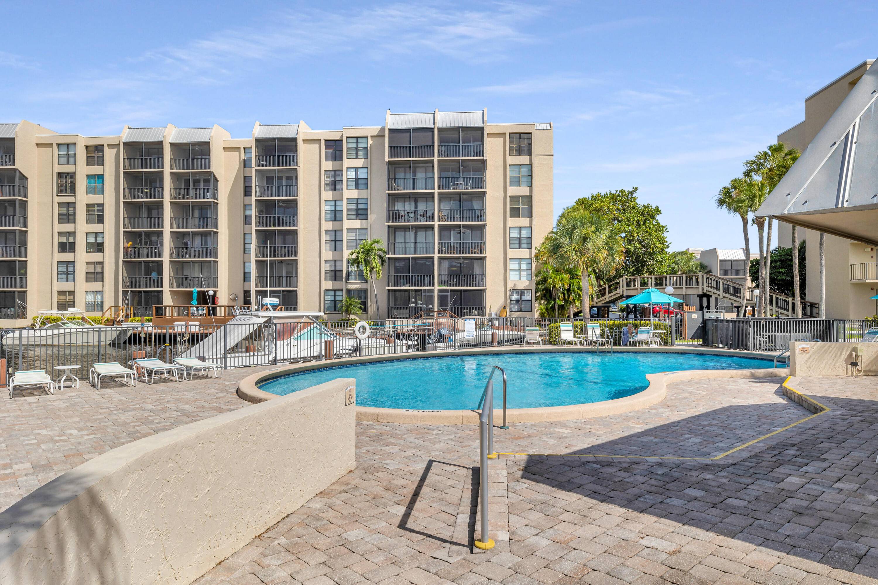 Escape to waterfront bliss in this beautifully maintained 2 bedroom, 2 bathroom condo nestled within a premier, active boating community in the heart of East Boca Raton.