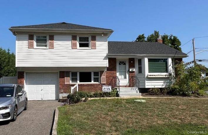 Beautiful split level home in the heart of North Babylon.