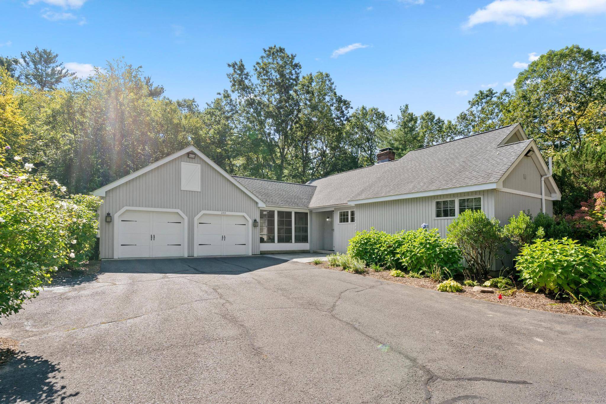 Nestled on 4. 83 acres of privacy, this beautifully crafted, custom built home offers warmth and a sense of calm that's hard to find.