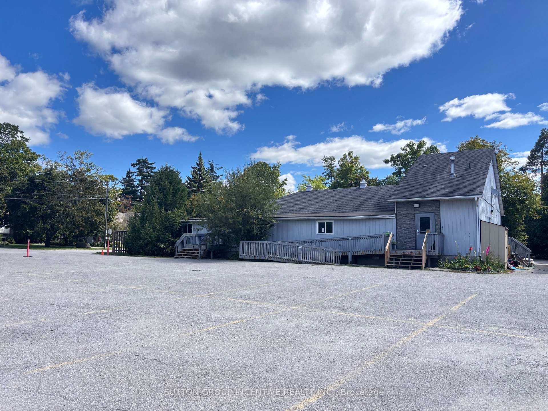 Discover this well maintained freestanding commercial building on 25th Sideroad, offering approximately 4, 000 sq.