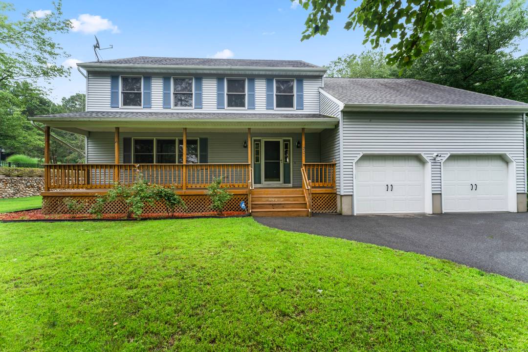 Welcome to this charming two story Colonial nestled in a friendly neighborhood, offering a perfect blend of comfort, space, and thoughtful updates.