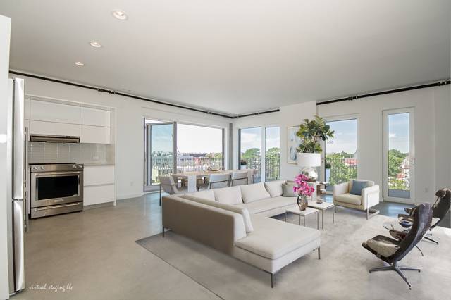 This corner 2BR unit at Hello New York 651 New York Avenue successfully integrates the richness of lodge style with the sophistication of classic loft living.