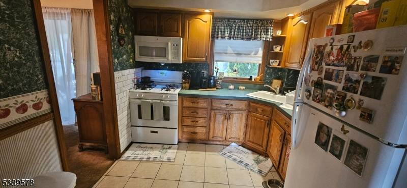 Discover the charm and potential of this inviting home nestled in the heart of North Plainfield.