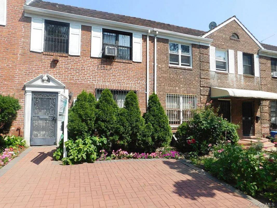 This beautiful home features a welcoming entry foyer, a spacious living room, a formal dining room, and an eat in kitchen with access to a patio, perfect for entertaining.