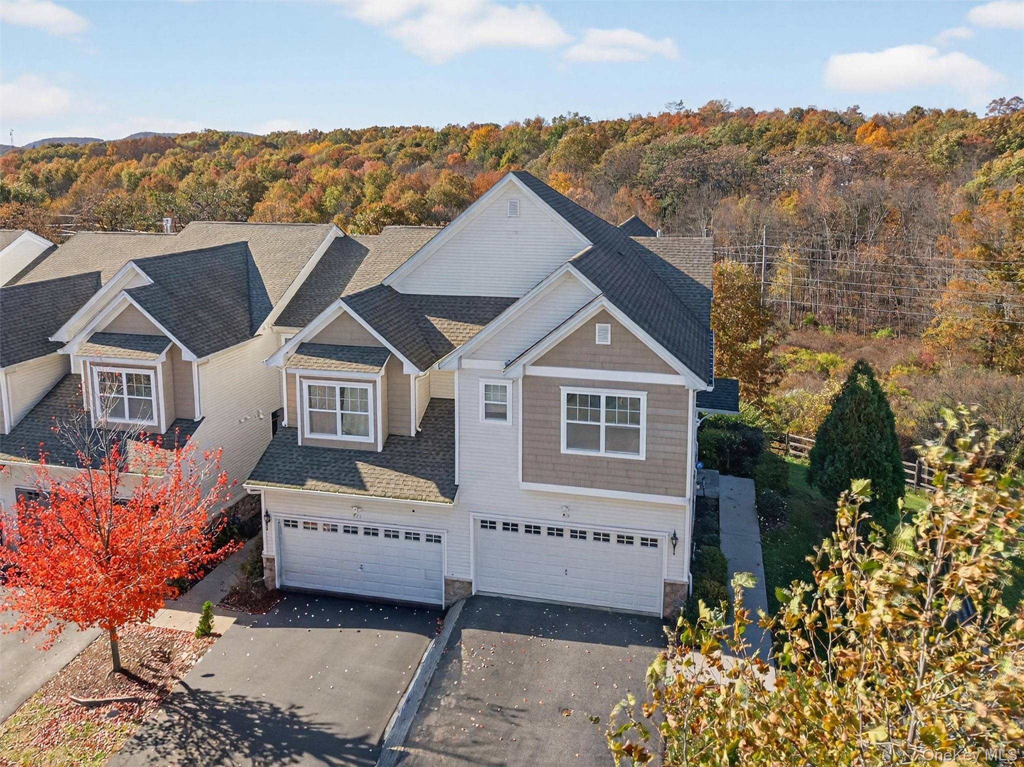 Maple Fields Luxury Townhouse desirable end unit located privately toward the back of the community with its own front entrance.