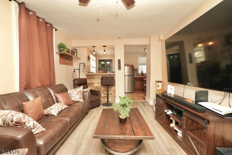 The home includes a spacious backyard with a brand new fenced in section, perfect for outdoor enjoyment, entertaining, or relaxation.