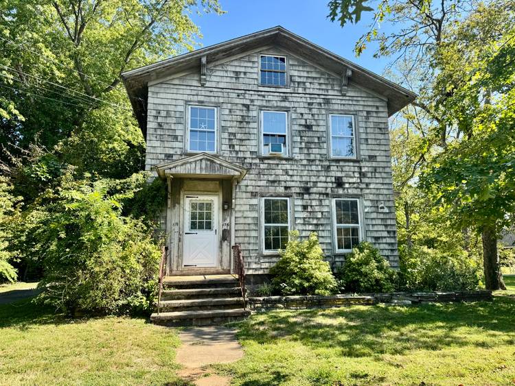 Exceptional Investment Opportunity Prime Guilford Location Just steps from the vibrant Guilford Green, this historic multifamily property features two spacious 2 bedroom, 1 bathroom units on a level 0.