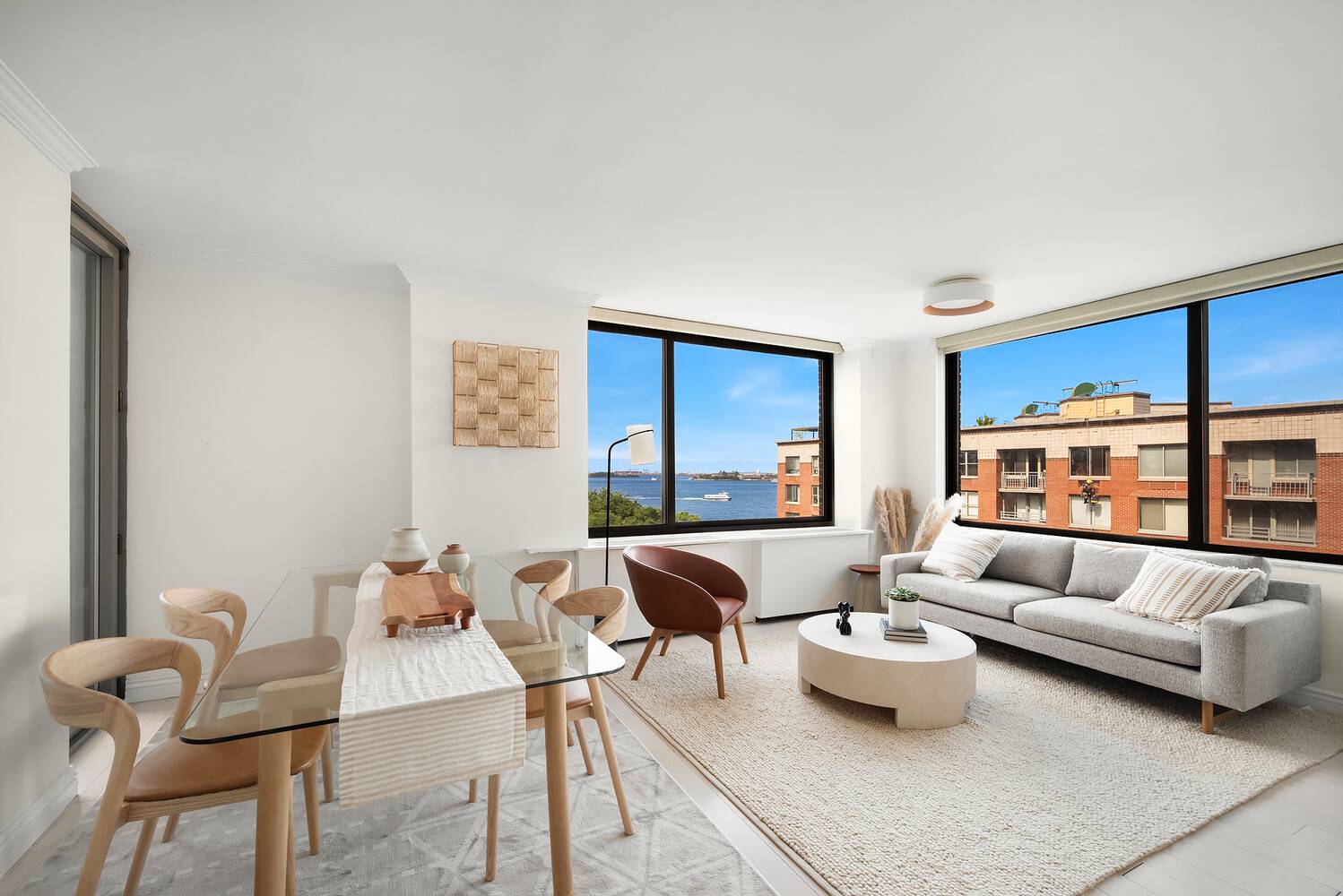 WOW ! ! ! Welcome to Residence 9B, a stunning top floor, corner unit with front row views of the Statue of Liberty.