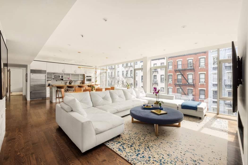 Spectacular, mint renovated residence designed for how people live today This 5 bedroom, 5.