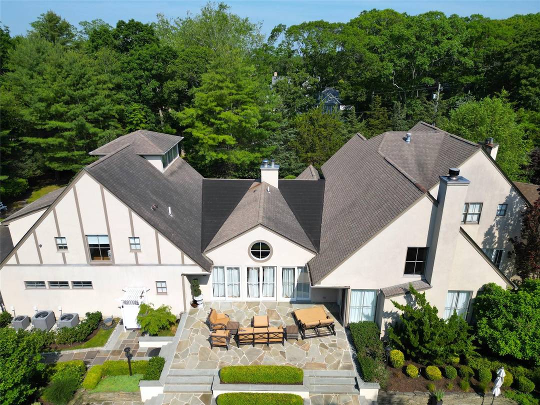 Entertainer's delight featuring 5 en suite bedrooms plus primary suite on first floor, professional chef's kitchen, open dining area, formal dining room, study w gas fireplace and living room w ...