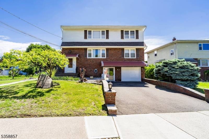 Two Family Home with Income Potential Ideal Location.