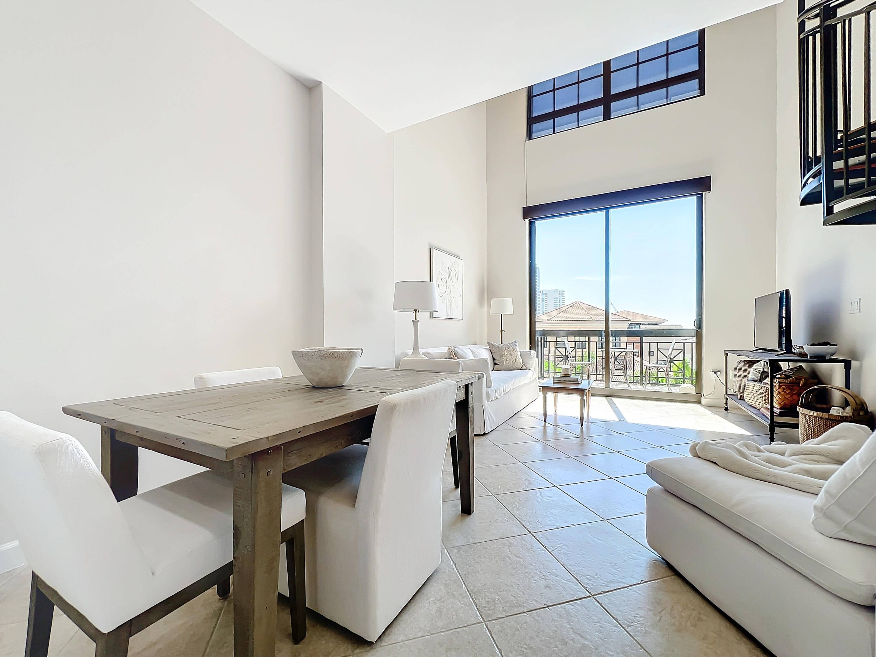 Rare Loft Condo in the Heart of Downtown West Palm BeachThis unique loft condo features double height ceilings and large windows with remote controlled coverings, filling the space with natural ...