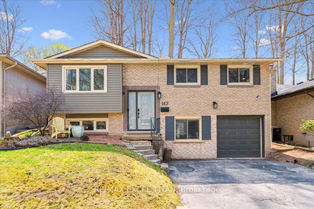 Welcome to 147 Coach Hill Drive A Beautifully Maintained Raised Bungalow in the Heart of Country Hills !