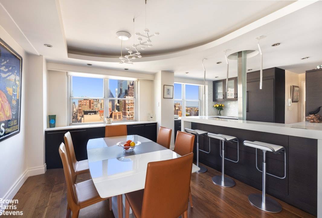 High Floor Convertible 2 Bedroom with Iconic Views 31st Floor Perched high on the 31st floor, this architecturally refined convertible 2 bedroom, 1.