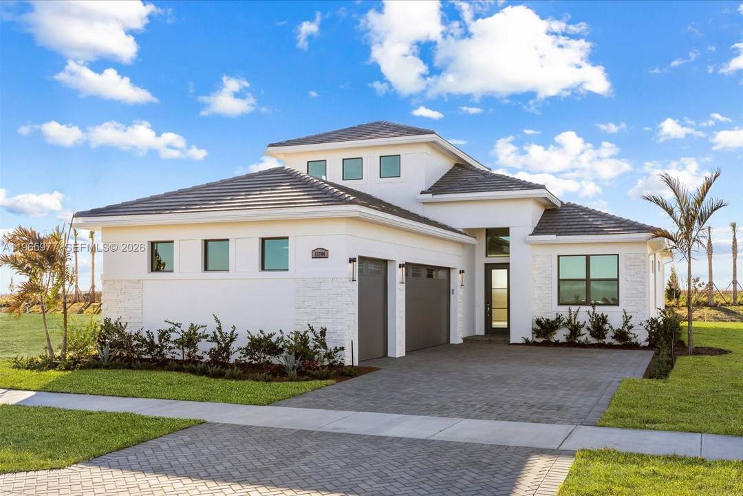 Move in ready new construction, this Kolter Homes Leslie model is located in Tradition's Astor Creek, one of the most desirable communities in Port St.